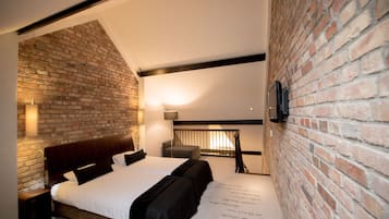 Minibar, coffres-forts dans les chambres, bureau