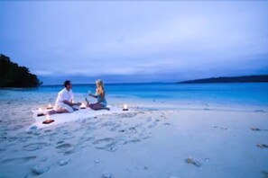 Private beach, white sand, sun loungers, beach umbrellas