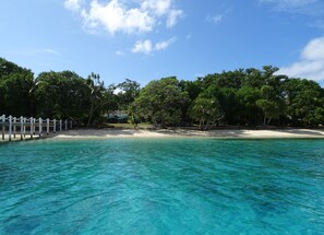 Private beach, white sand, sun-loungers, beach umbrellas