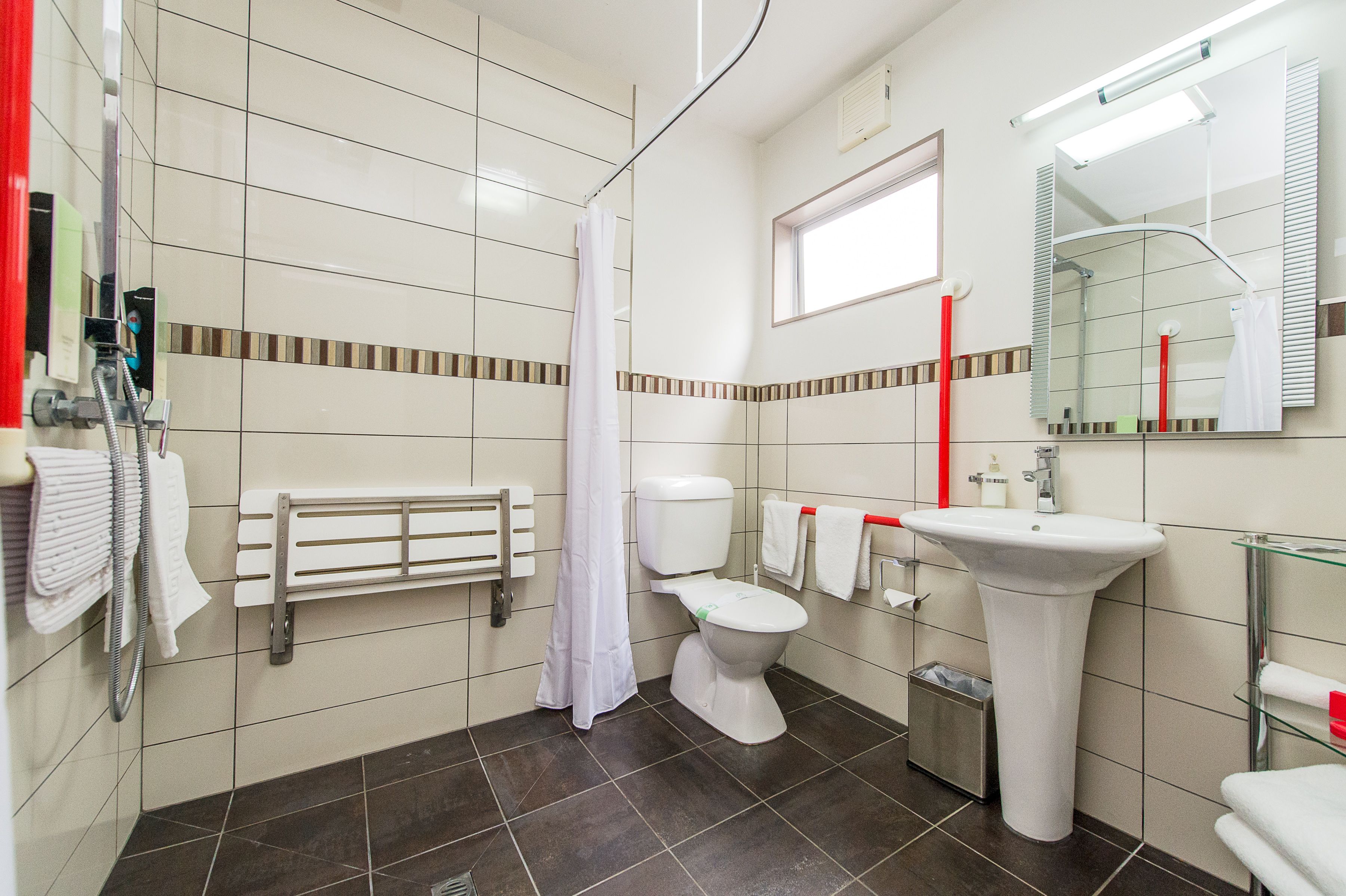 Senior Studio | Bathroom | Shower, designer toiletries, hair dryer, towels