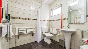 Senior Studio | Bathroom | Shower, designer toiletries, hair dryer, towels