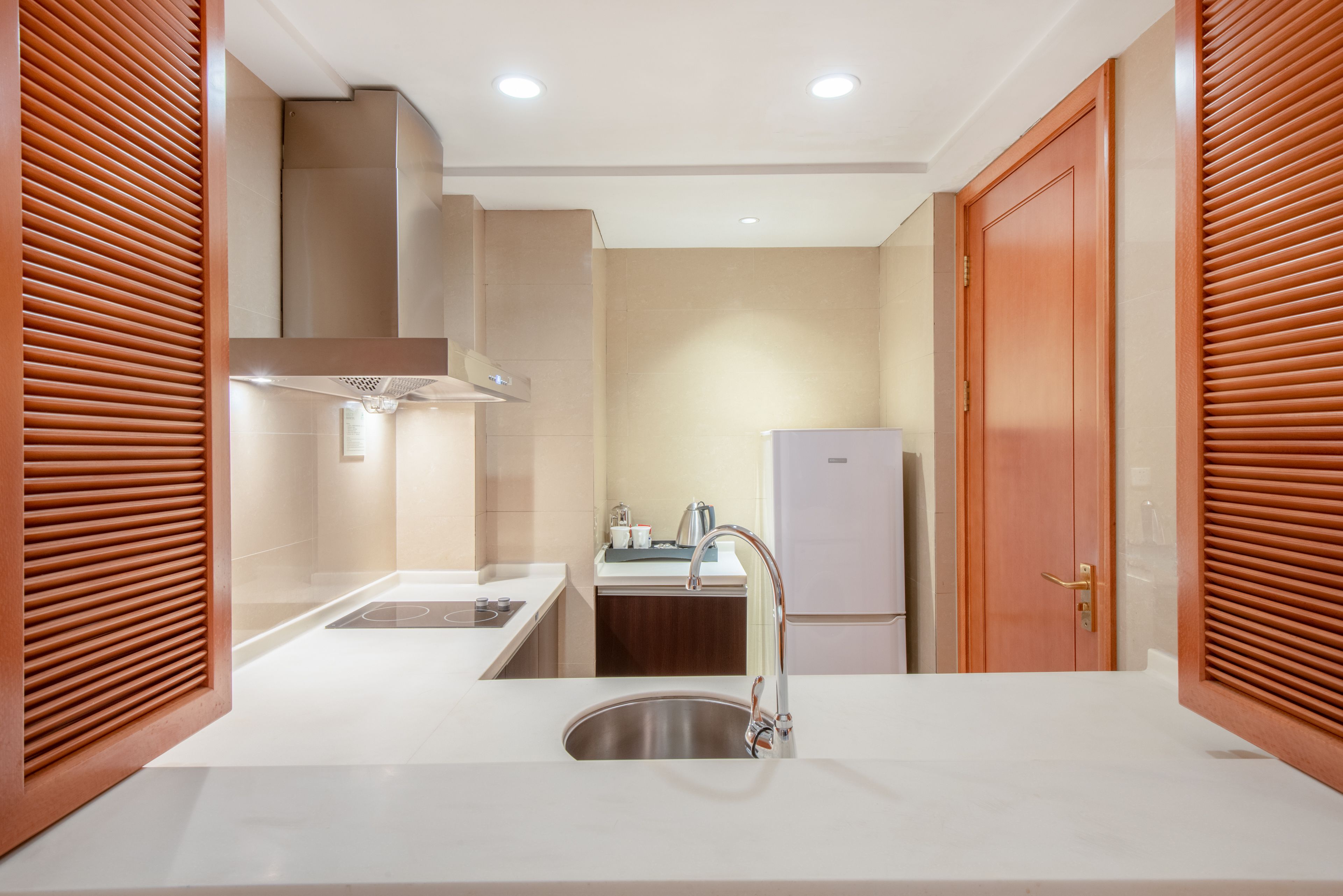 suite, 1 bedroom, kitchen (living dining meeting) | room amenity