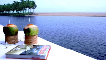 Enjoy a leisurely moment with a refreshing drink and a good book.