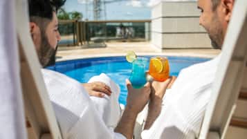 Outdoor pool, pool umbrellas, pool loungers