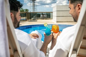 Outdoor pool, pool umbrellas, sun loungers