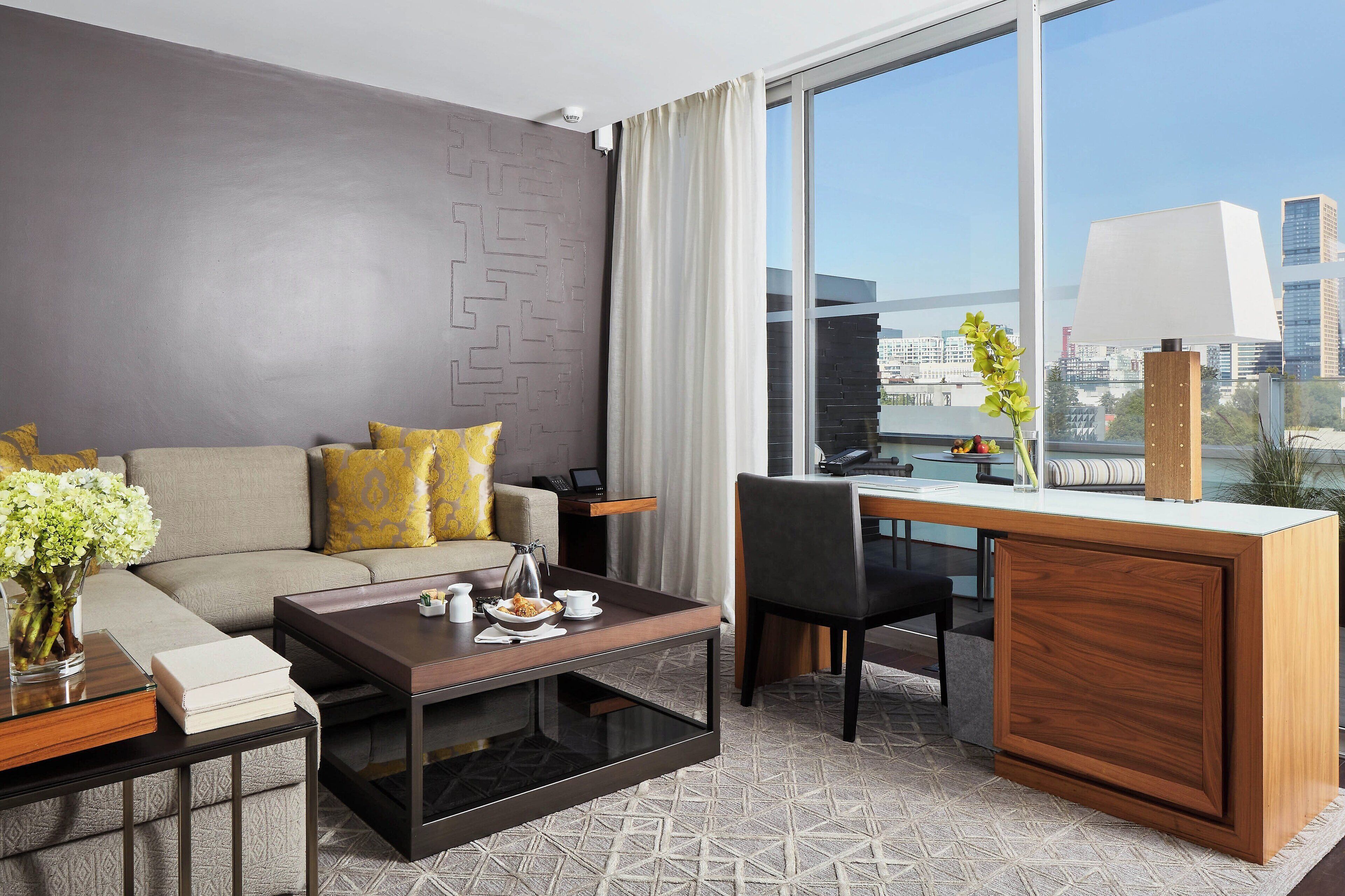 junior suite, 1 king bed, non smoking, balcony | living room | 55-inch flat-screen tv with satellite channels, tv, netflix