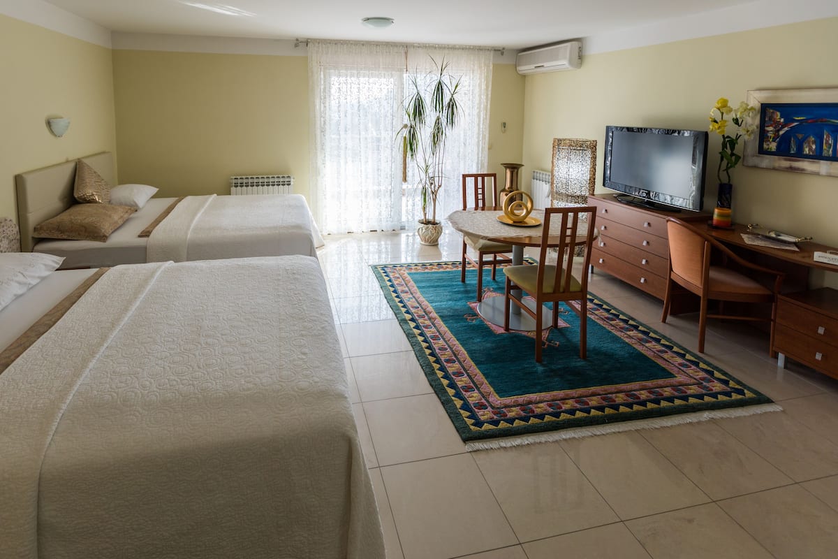 Hypo-allergenic bedding available, minibar, in-room safe, desk