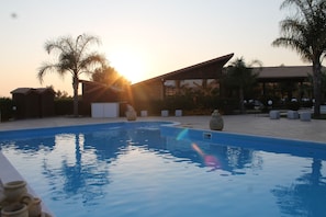 Outdoor pool, pool umbrellas, pool loungers