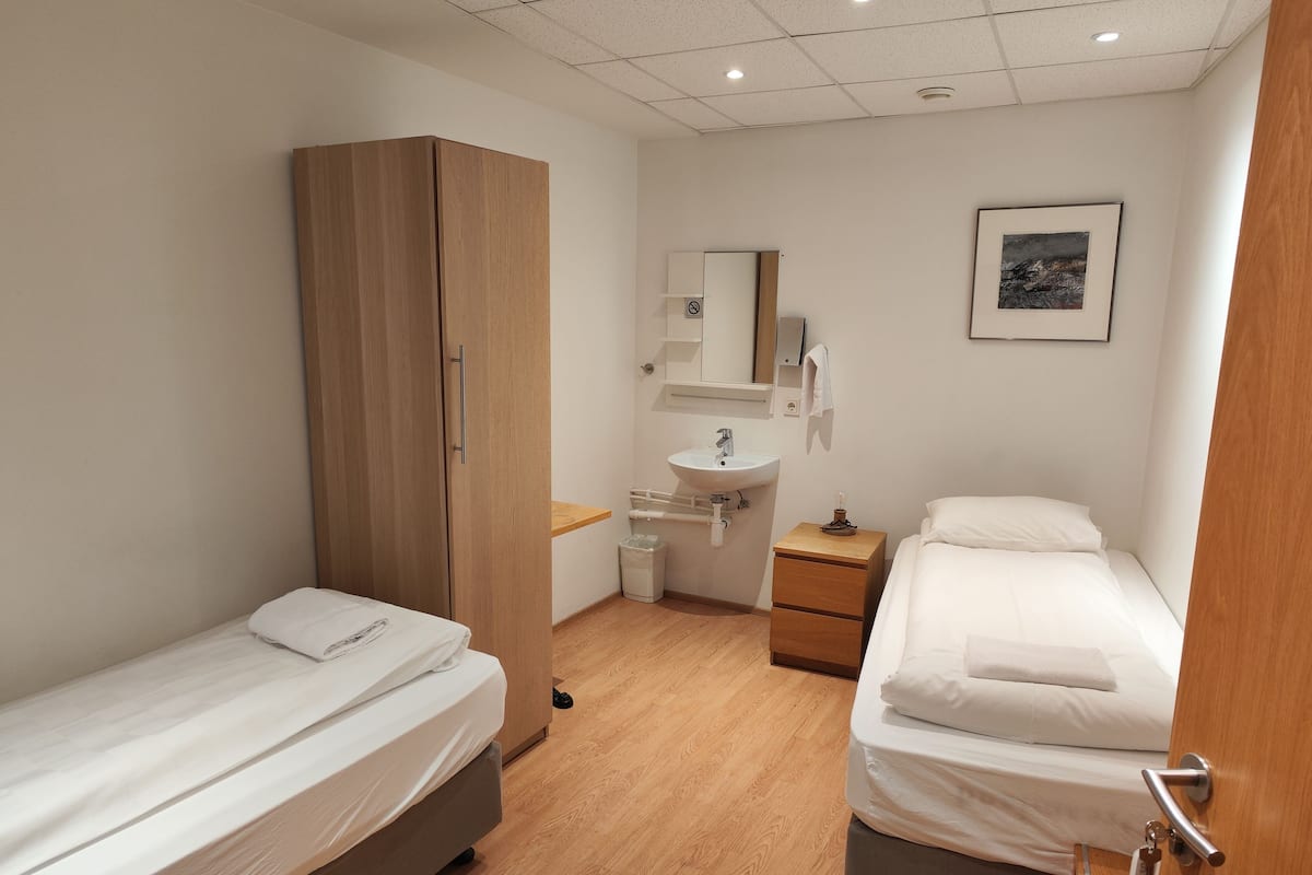Economy Twin Room, No Window, Shared Bathroom | Desk, soundproofing, free WiFi, bed sheets