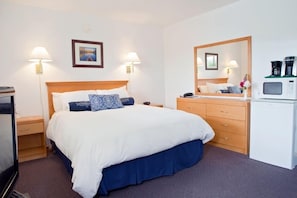 Down comforters, Select Comfort beds, desk, iron/ironing board