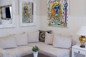 Deluxe Double Room | Living area | Flat-screen TV