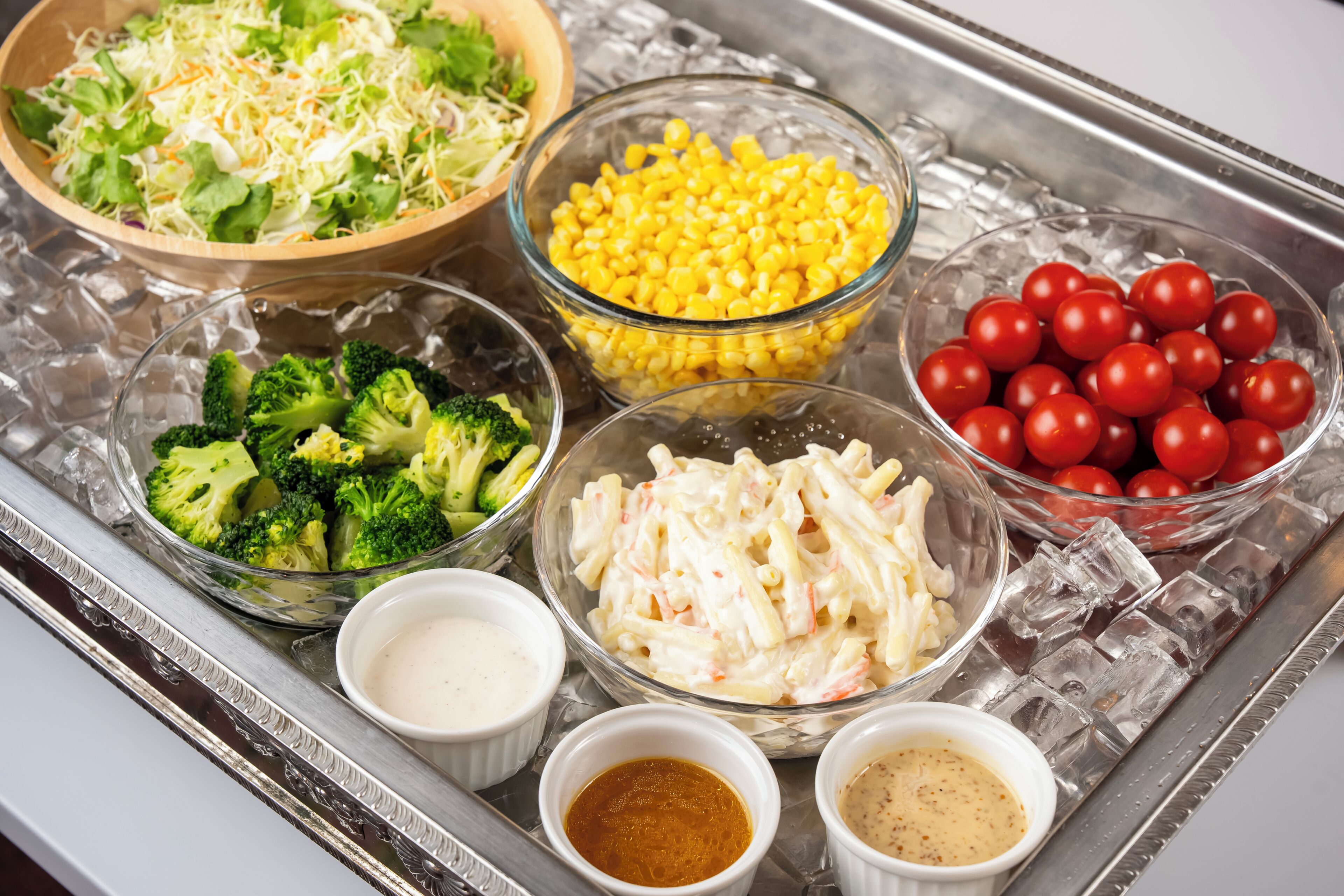 A tray with various food items and condiments.