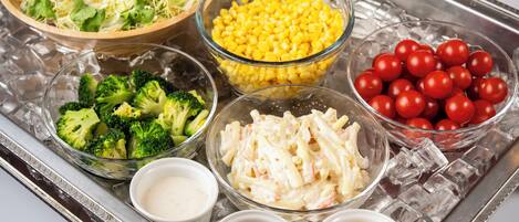 A tray with various food items and condiments.