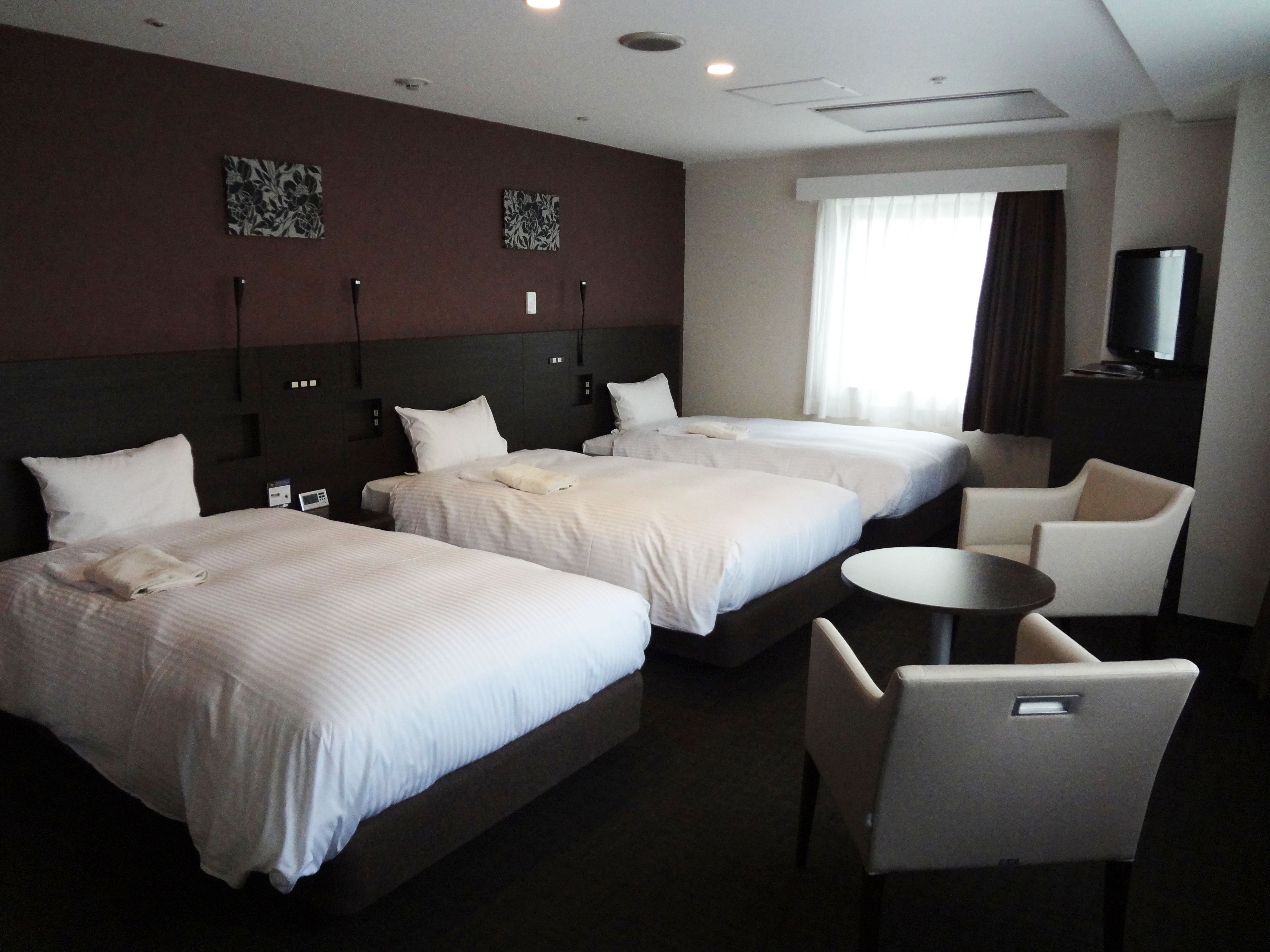 triple room, non smoking | premium bedding, down duvets, desk, blackout curtains