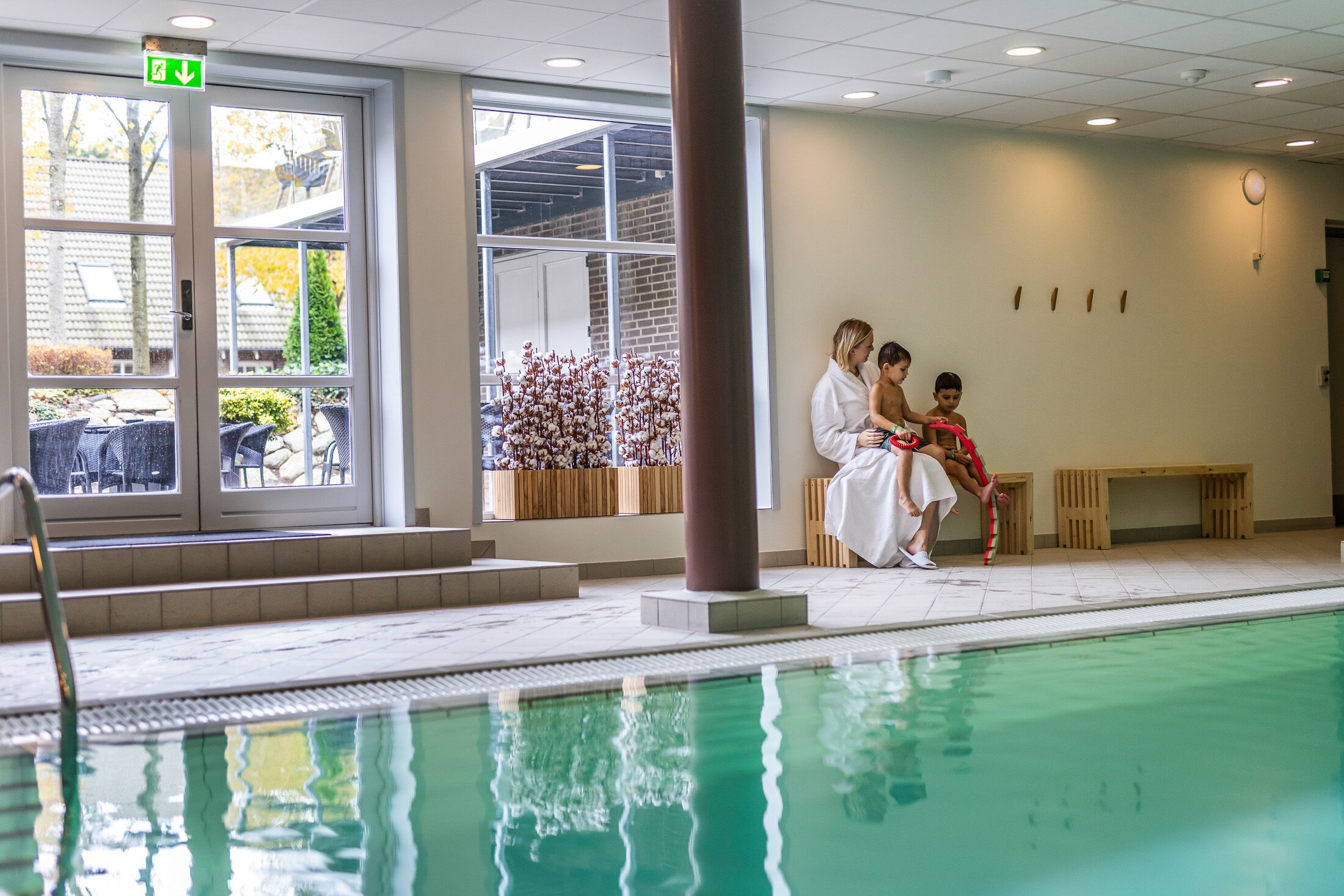 indoor pool, open 7:00 am to 10:00 pm, pool loungers