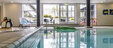 Indoor pool, open 7:00 AM to 10:00 PM, sun loungers