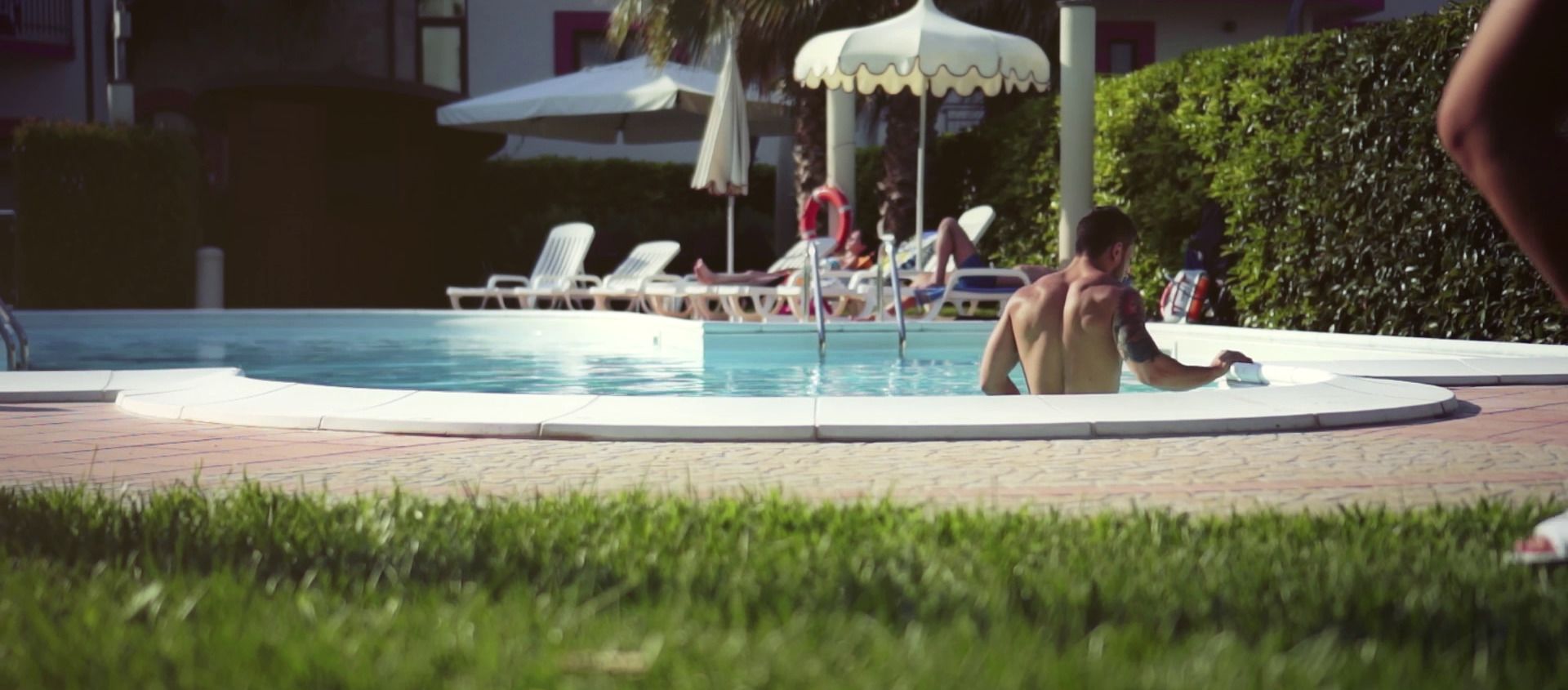 seasonal outdoor pool, pool umbrellas, pool loungers