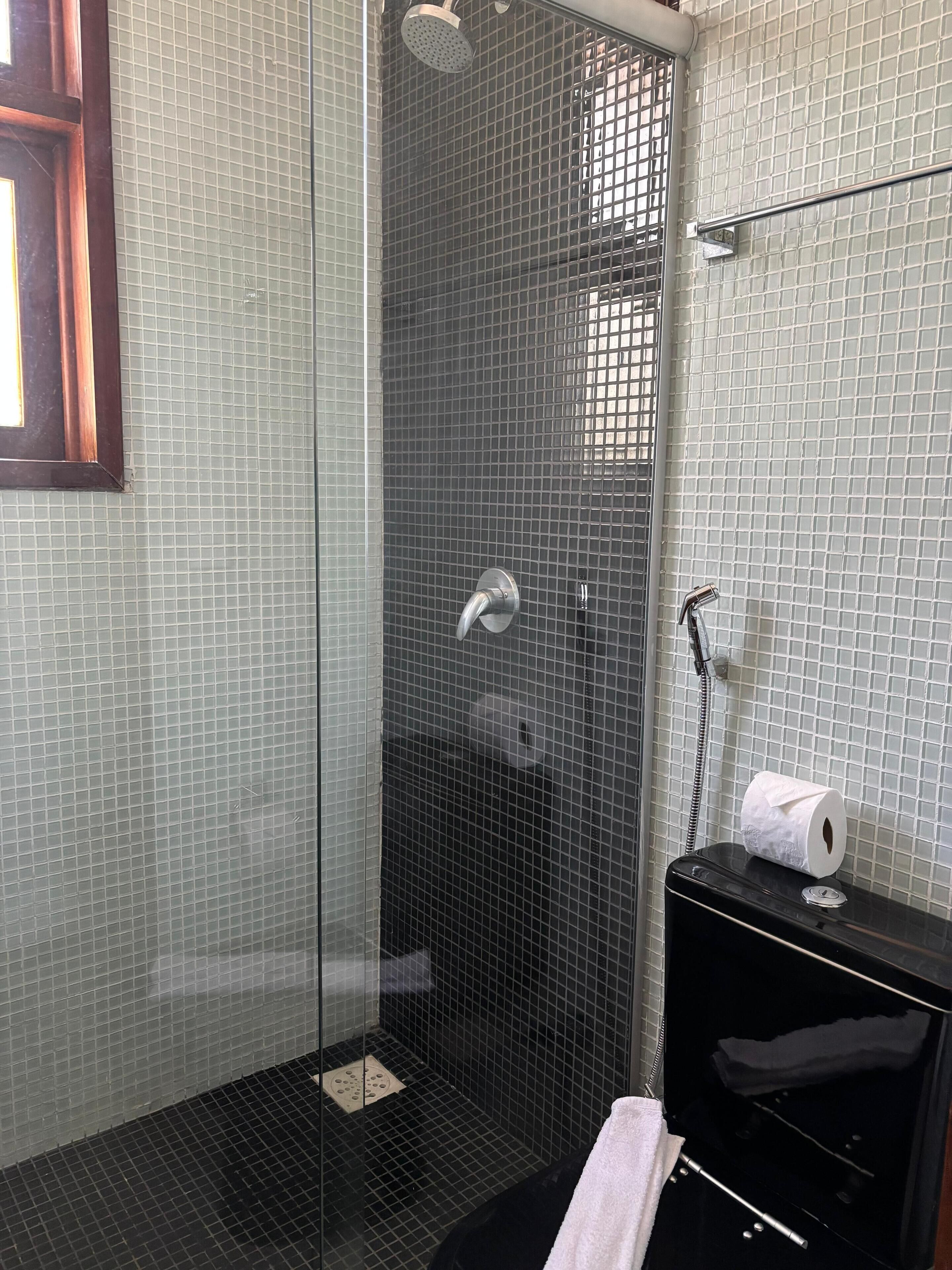 deluxe twin room | bathroom | shower, towels, soap