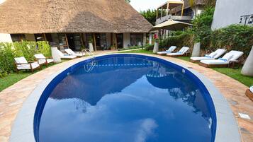 Outdoor pool, pool umbrellas, pool loungers