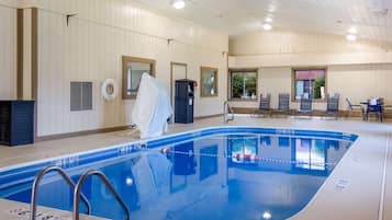 Relax by the pool, where guests can swim and enjoy the surrounding deck with lounge chairs.