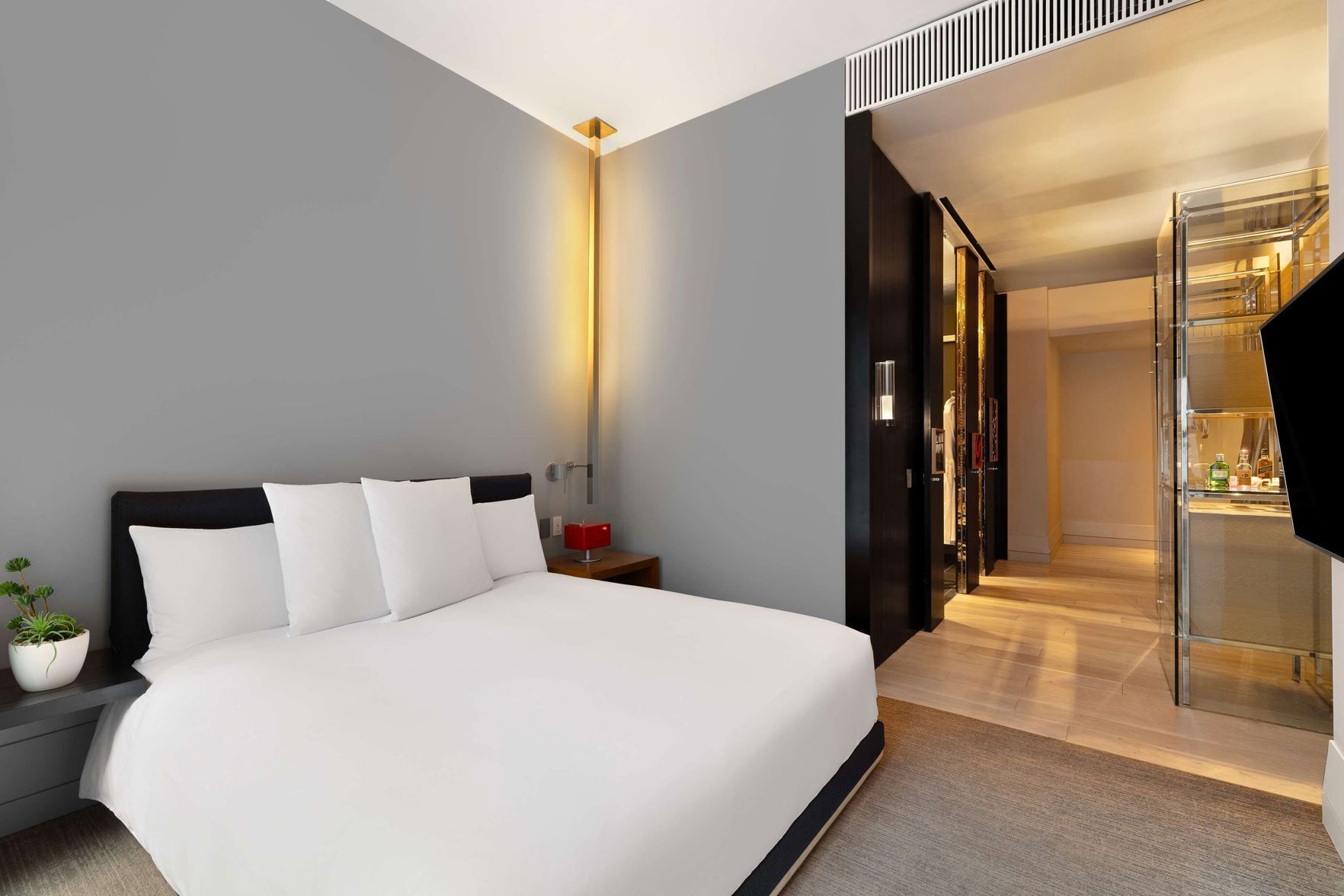 Premium bedding, pillow-top beds, free minibar, in-room safe