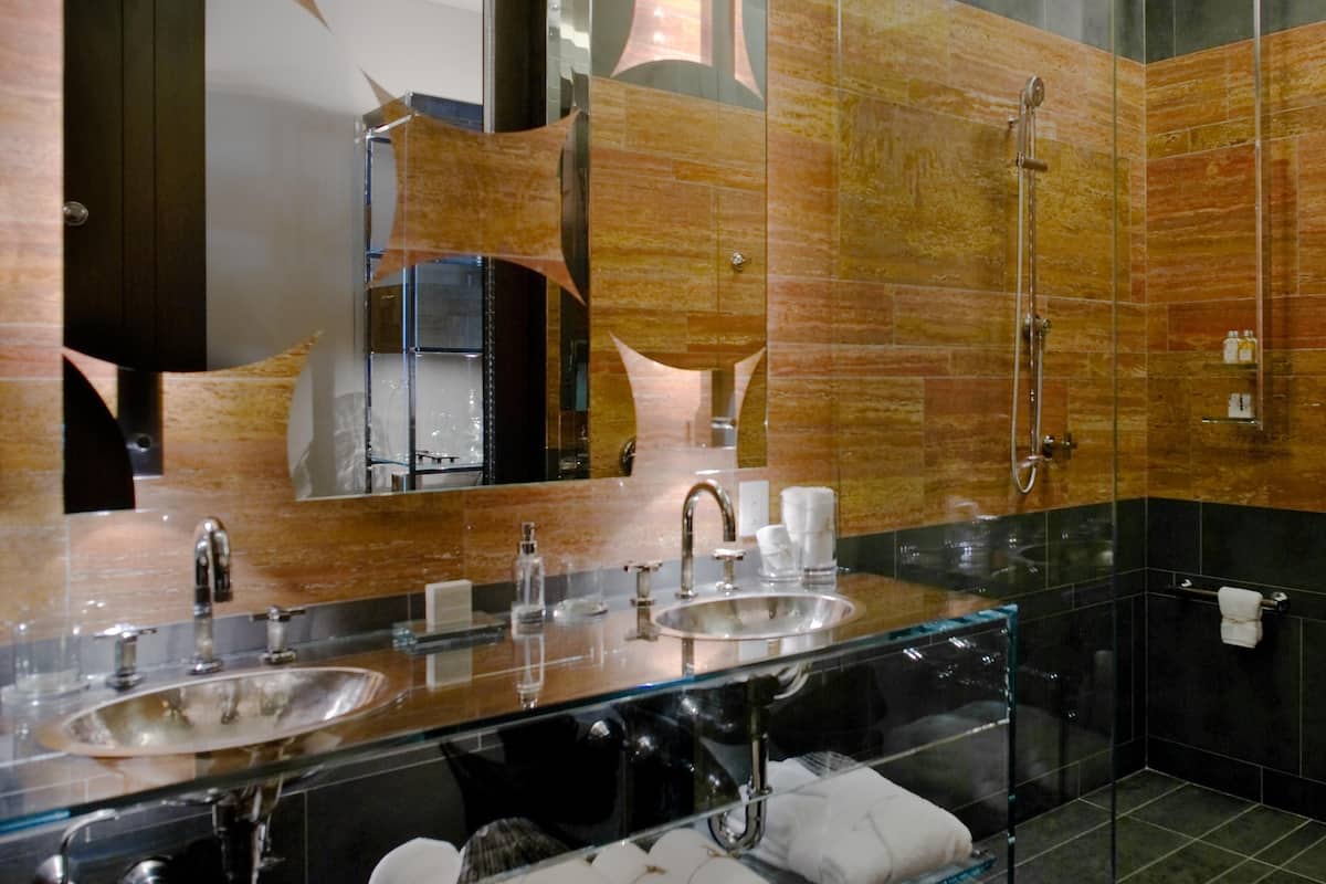 Rainfall showerhead, designer toiletries, hair dryer, bathrobes