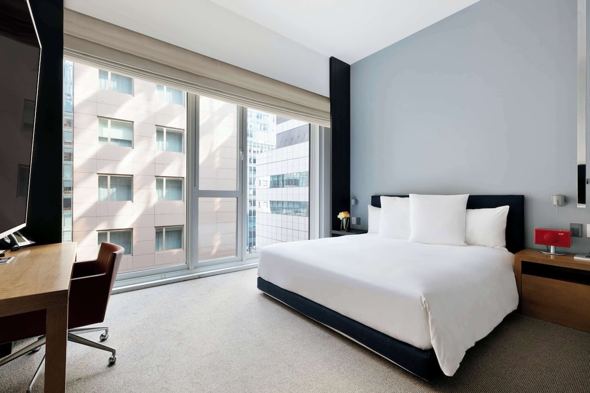 Luxe beddengoed, pillowtop-bedden, een gratis minibar