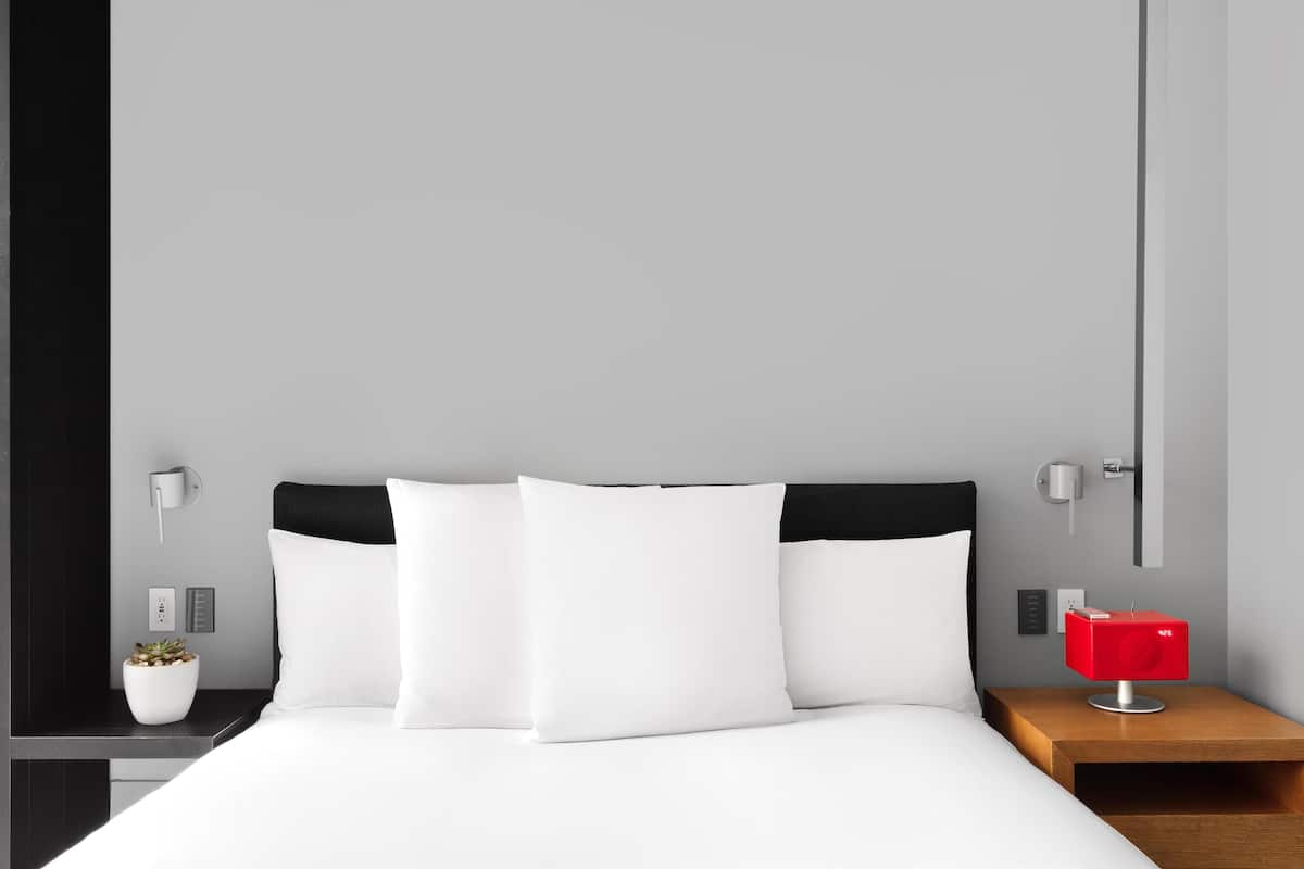 Premium bedding, pillow-top beds, free minibar, in-room safe