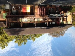 A two-story building with a sign reading "RECREATION". - Humboldt Redwoods Inn (Garberville)
