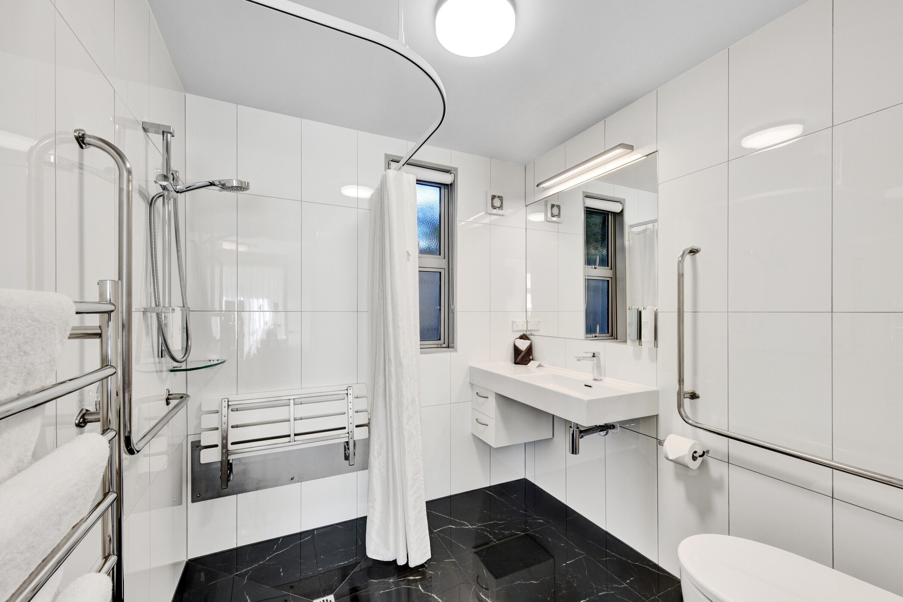 superior studio, 1 king bed, accessible | bathroom | rainfall showerhead, free toiletries, hair dryer, towels