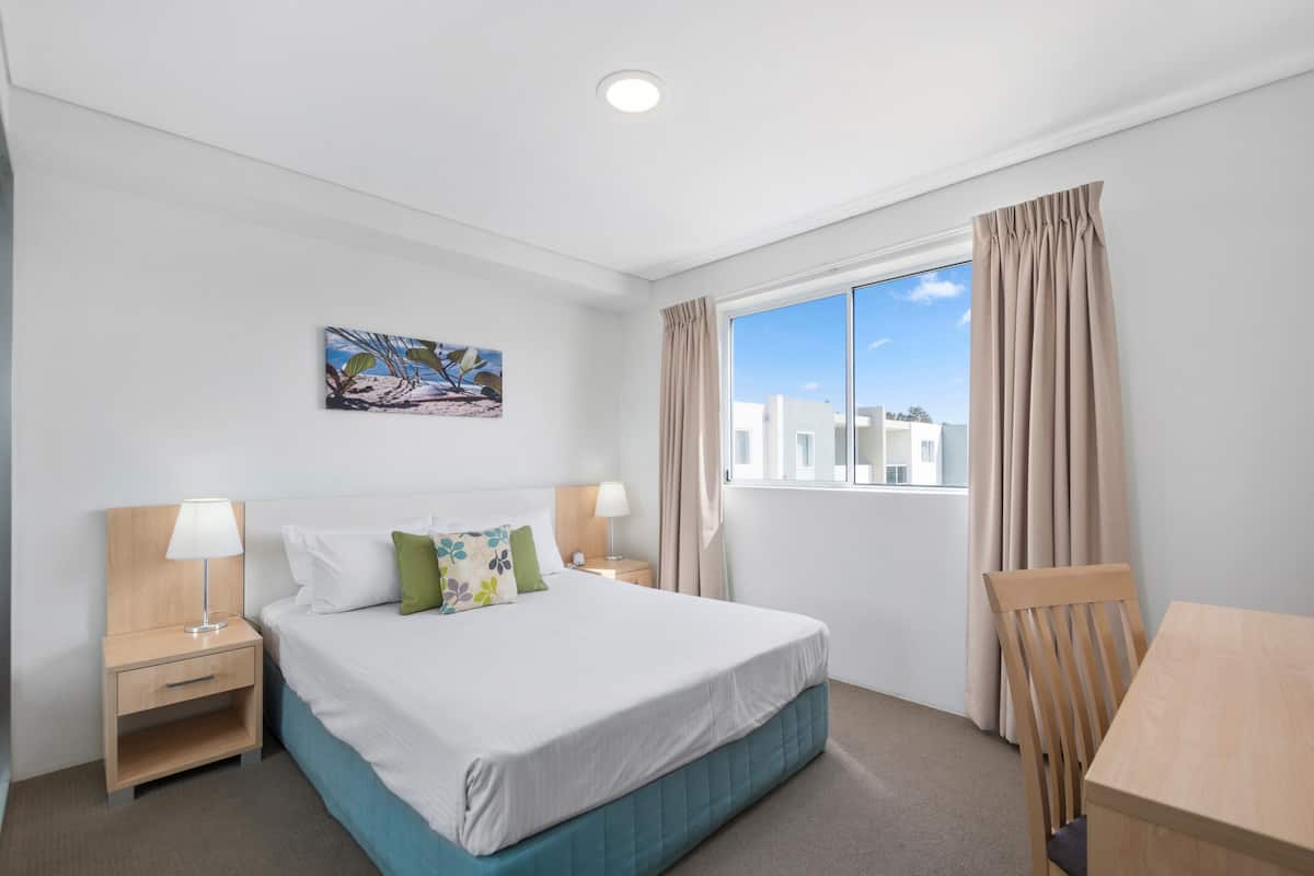 two bedroom apartment | minibar, desk, iron/ironing board, cots/infant beds