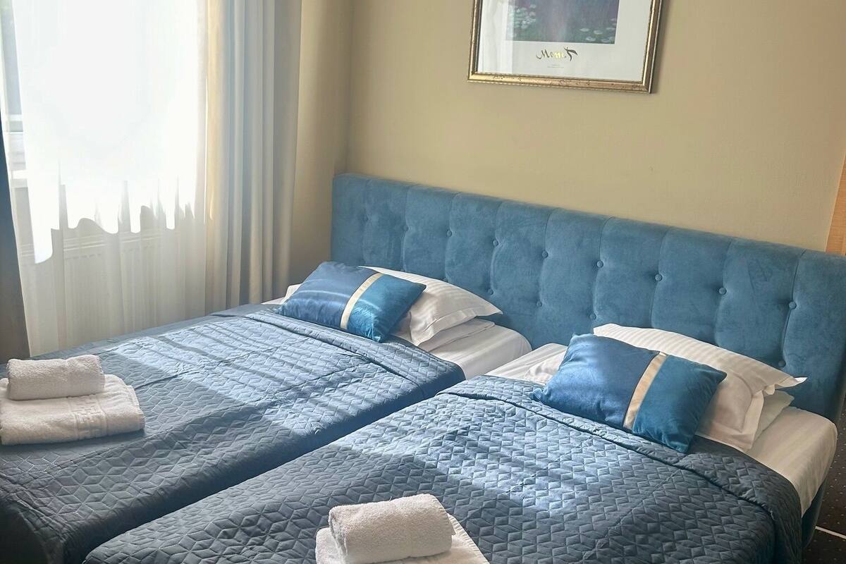 Premium bedding, down comforters, memory foam beds, desk