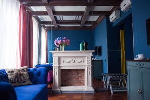 Suite junior | Zona de estar | Una televisión de pantalla plana