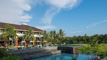 2 outdoor pools, pool umbrellas, pool loungers