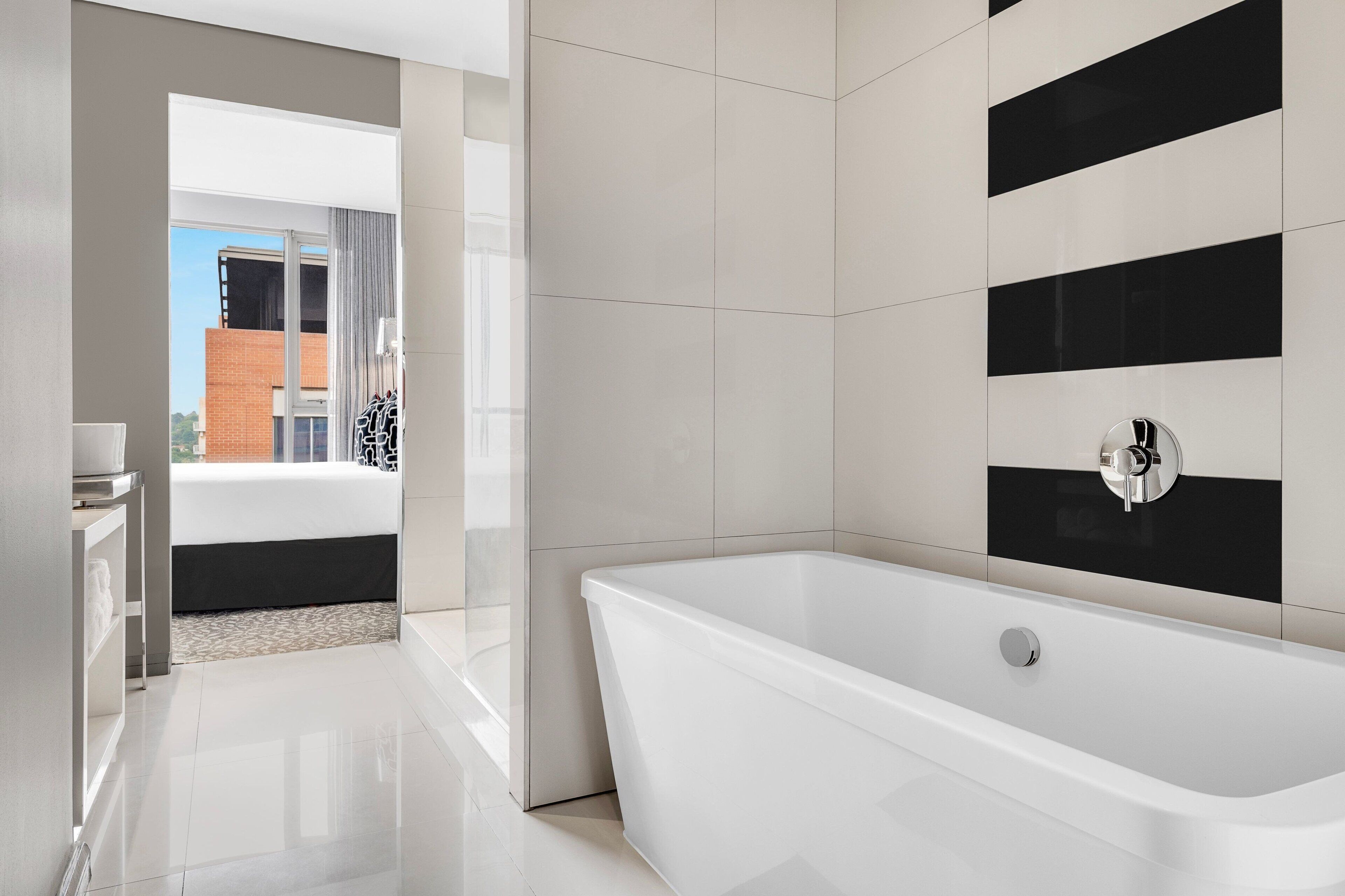 junior suite, 1 king bed | bathroom | shower, free toiletries, hair dryer, towels