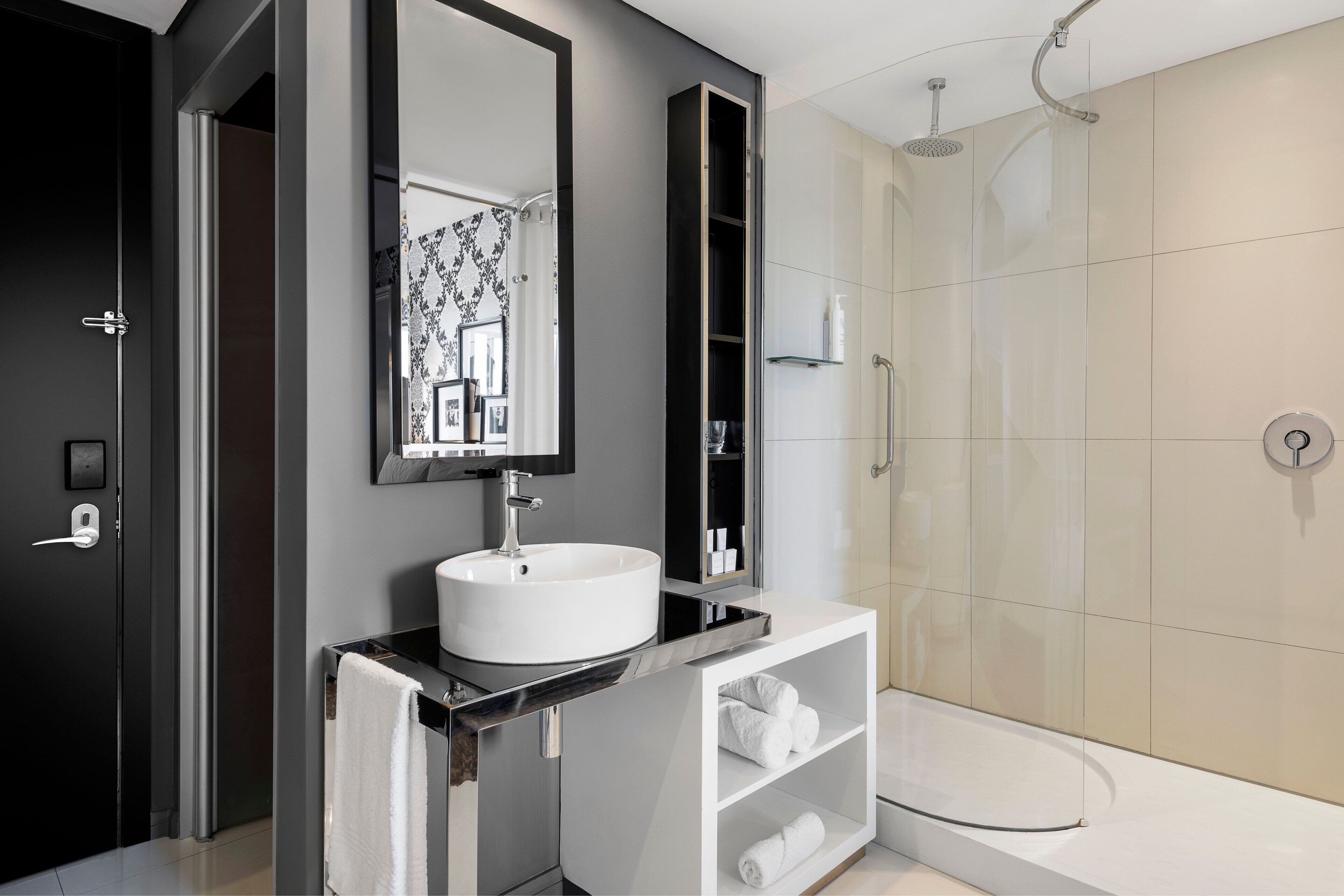 shower, free toiletries, hair dryer, towels