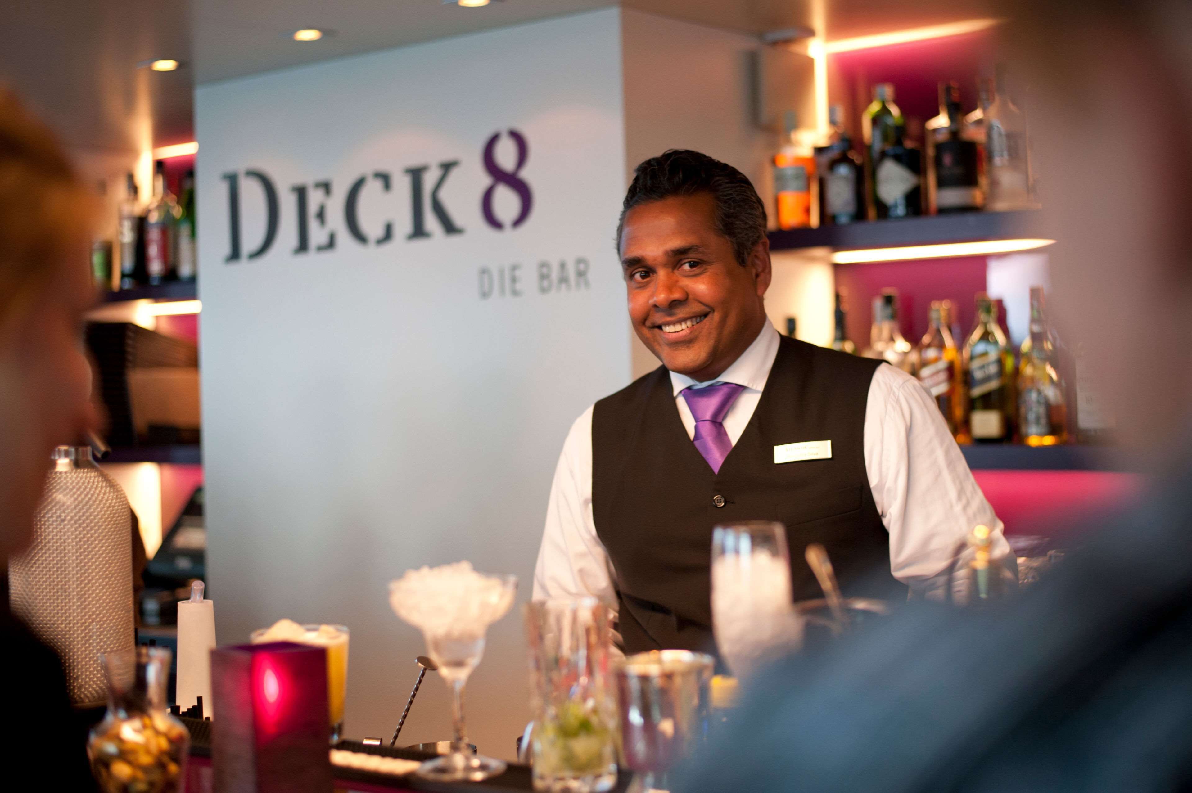 A bar area with a sign reading "DECK 8 DIE BAR".
