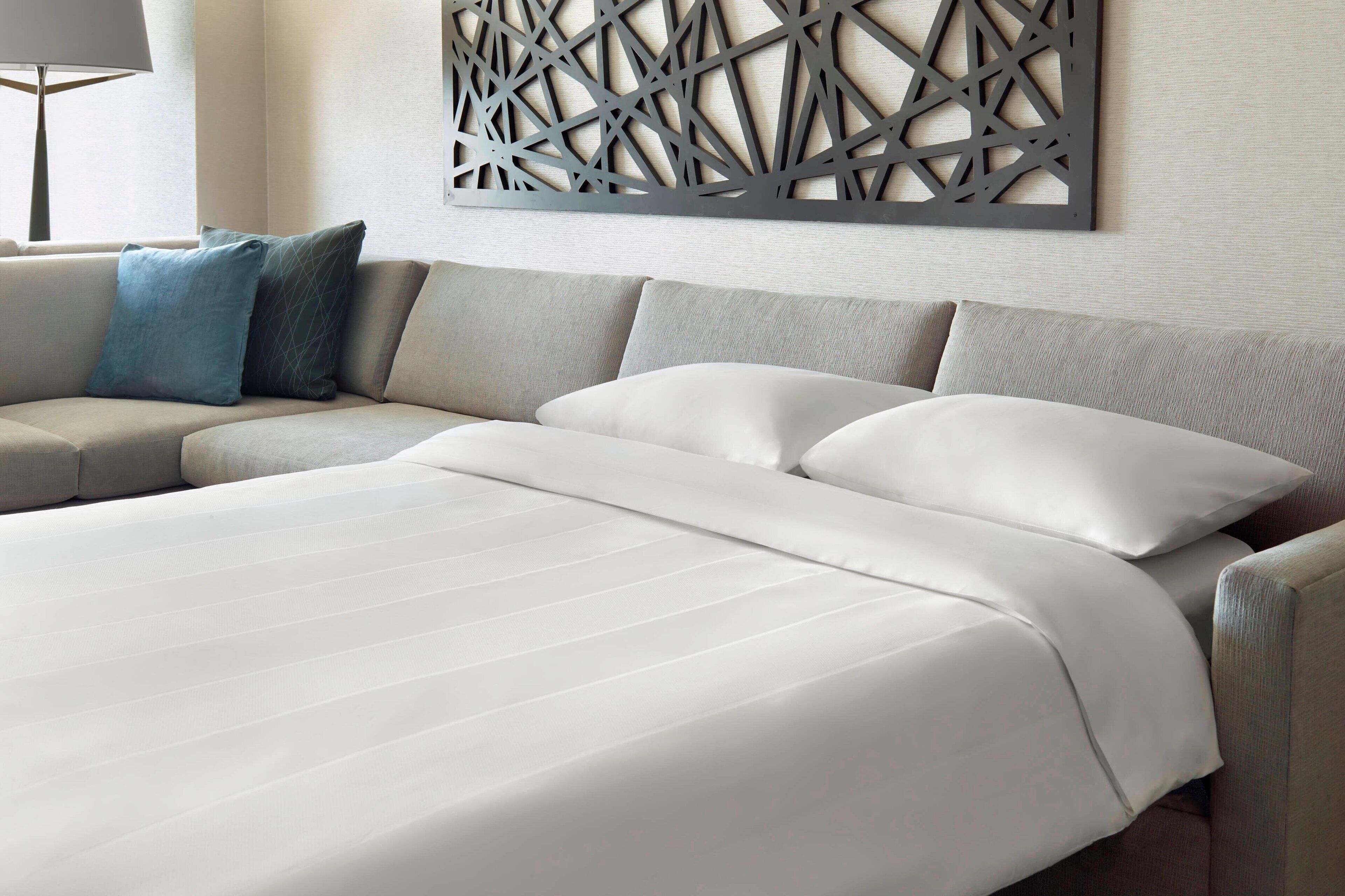 premium bedding, down duvets, pillow-top beds, in-room safe