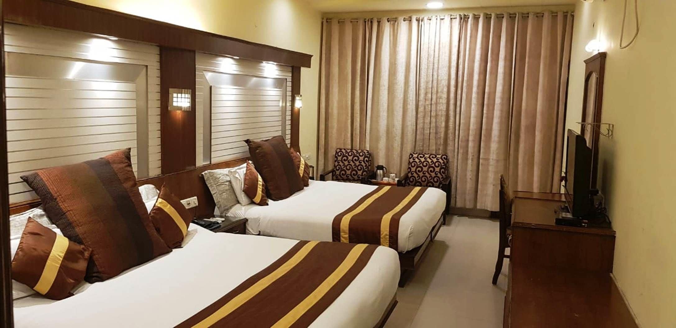 套房 | 高档床上用品、羽绒被、Select Comfort 床、客房内保险箱