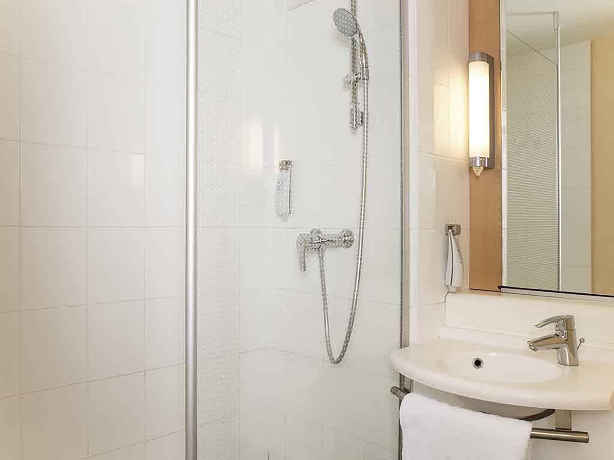 shower, eco-friendly toiletries, hair dryer, towels