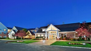 A hotel with a well-lit entrance, a covered porch, and a sign indicating it is a Marriott hotel. - Residence Inn Bridgewater Branchburg (Branchburg)