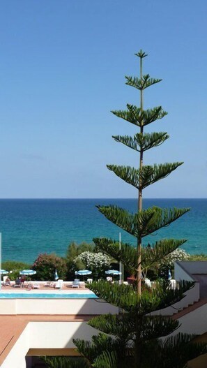 Private beach, sun-loungers, beach umbrellas, snorkelling