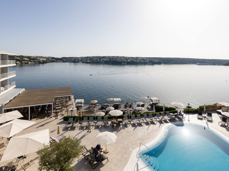 Seasonal outdoor pool, pool umbrellas, pool loungers