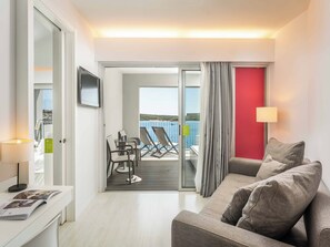 32-inch flat-screen TV with satellite channels, TV