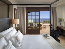 Premium bedding, down comforters, minibar, in-room safe