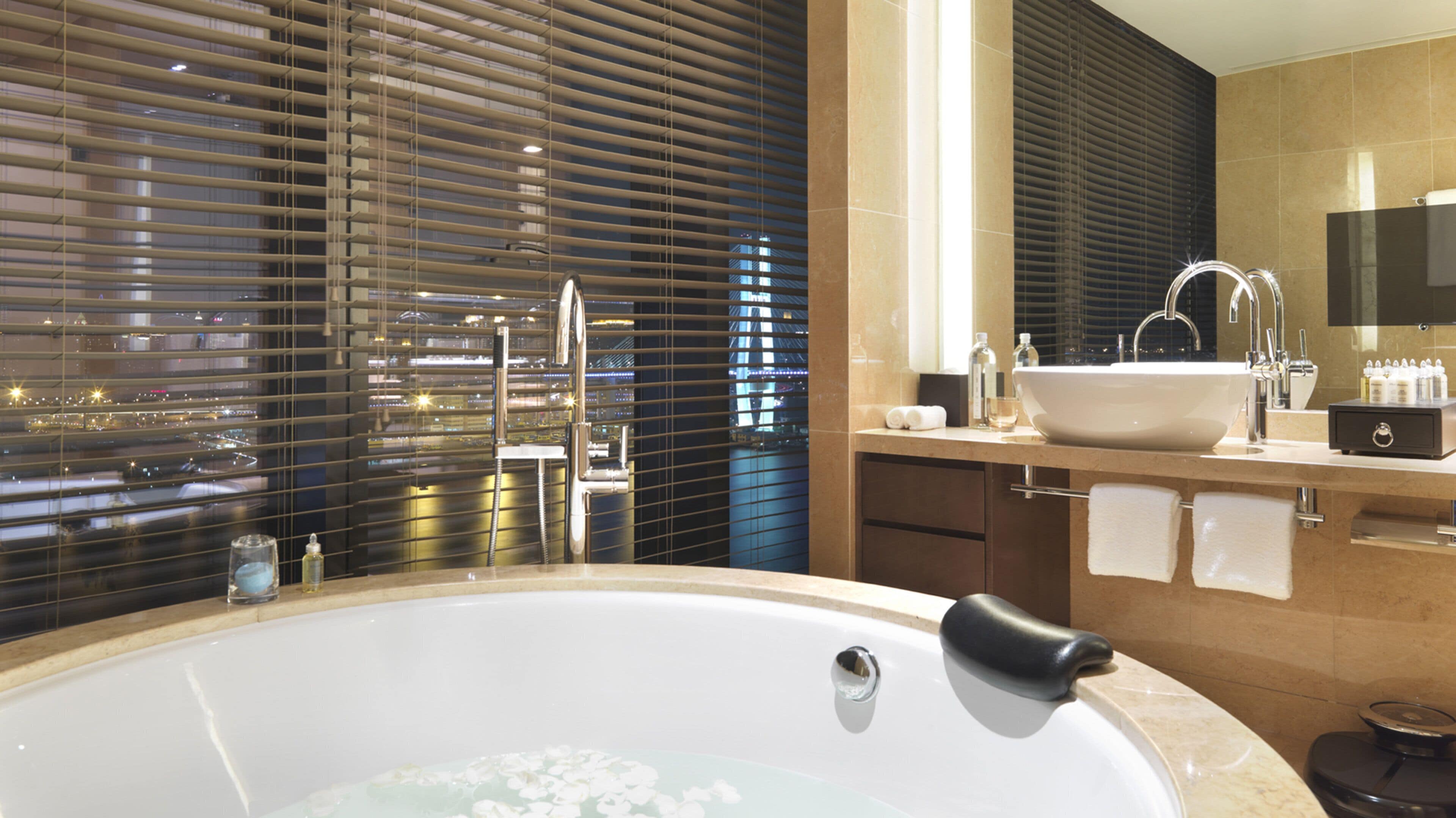 combined shower/bathtub, free toiletries, hair dryer, bathrobes