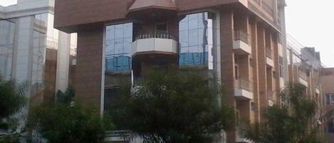 A multi-story building with a prominent 'Clarks Inn' sign.
