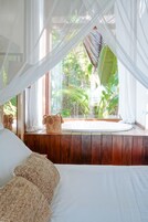 Deluxe Bungalow, Jetted Tub, Ocean View | Minibar, in-room safe, blackout drapes, free WiFi