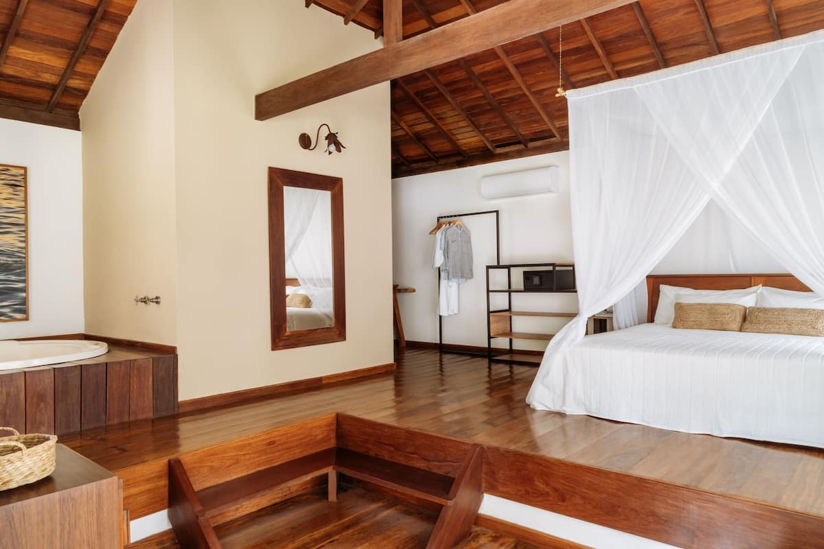 Superior Bungalow, Jetted Tub | Minibar, in-room safe, blackout drapes, free WiFi
