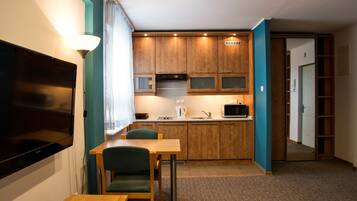 Standard Apartment, 2 Single Beds | Private kitchenette | Full-sized fridge, stovetop, cookware/dishes/utensils